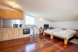 Kuchyňa alebo kuchynka v ubytovaní Apartman Aqua