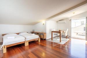 Posteľ alebo postele v izbe v ubytovaní Apartman Aqua