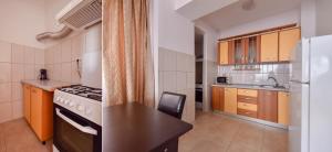 Køkken eller tekøkken på MAMAIA SAMMERLAND APARTAMENT 3 camere