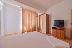 Et tv og/eller underholdning på MAMAIA SAMMERLAND APARTAMENT 3 camere