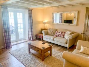 Et opholdsområde på Farriers Cottage