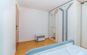 Ein Bett oder Betten in einem Zimmer der Unterkunft Apartments Vukelic