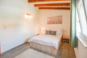 Postel nebo postele na pokoji v ubytování Villa Pave