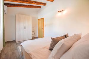 Postel nebo postele na pokoji v ubytování Villa Pave + 19 fotografií