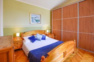 Postel nebo postele na pokoji v ubytování Apartment Albatros
