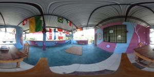 a childrens play room with a mural on the ceiling at Zumag Sisa in Tena