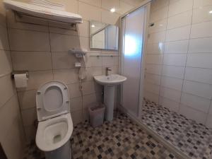 Koupelna v ubytování Yueli Homestay