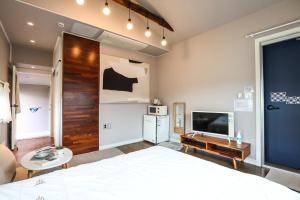 TV a/nebo společenská místnost v ubytování Haengok Guesthouse