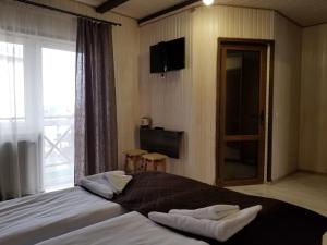Letto o letti in una camera di Guest House Mountain