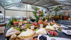 a buffet with many different types of food on display at TUI BLUE Khao Lak Resort - SHA Plus in Khao Lak