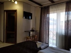 Letto o letti in una camera di Guest House Mountain