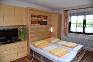 Posteľ alebo postele v izbe v ubytovaní Ferienwohnung Felix und Berta Pfeiffer-Vogl