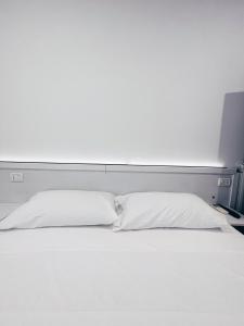Postel nebo postele na pokoji v ubytování Agriturismo La Rustica