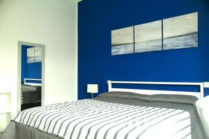 A bed or beds in a room at Le rose di Bino