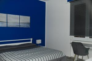 A bed or beds in a room at Le rose di Bino