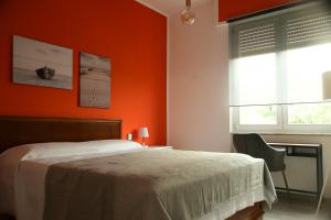 A bed or beds in a room at Le rose di Bino