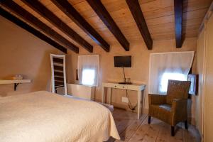 Säng eller sängar i ett rum på Castillo De Pilas Bonas