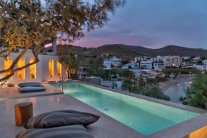 a swimming pool in a villa with a view at Marconi's seaside villa in Megas Gialos - Nites
