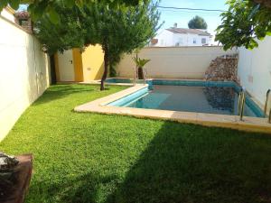 The swimming pool at or close to sol de membrillo