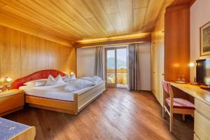 Postel nebo postele na pokoji v ubytování Hotel Stefanie