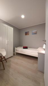 Ein Bett oder Betten in einem Zimmer der Unterkunft Gaiapart