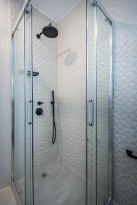 Koupelna v ubytování Remezzo Bayfront Suites