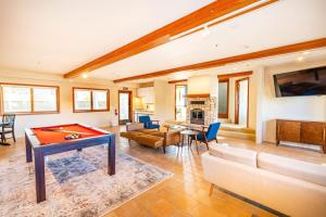 a living room with a pool table in it at Beach Villa Home - Walk to Beaches Trails Restaurants Activities & more in Half Moon Bay