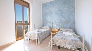 Voodi või voodid majutusasutuse Apartment Mikao - Torre Pali toas