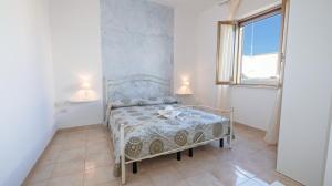 Voodi või voodid majutusasutuse Apartment Mikao - Torre Pali toas