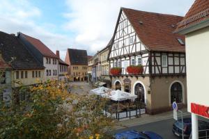 a view of a town with white and black buildings at Apartment Am Kurpark in Bad Frankenhausen