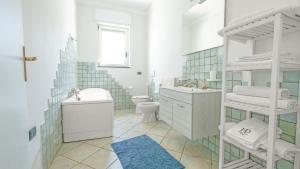 Ett badrum på VIlla Ercolani Luxury by HDSalento