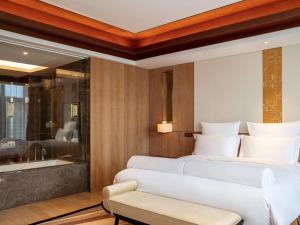 Katil atau katil-katil dalam bilik di Pullman Changbaishan Resort