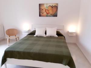 Postel nebo postele na pokoji v ubytování B&B Bell'aria
