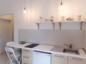 Kuchyň nebo kuchyňský kout v ubytování B&B Bell'aria