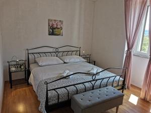 Łóżko lub łóżka w pokoju w obiekcie Kuća za odmor "Na Paltu"