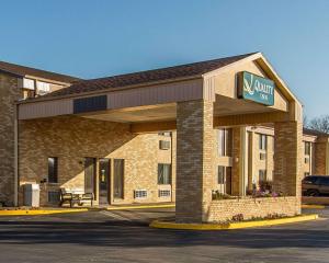 a building with a sign for a hotel at Quality Inn Burlington near Hwy 34 in Burlington