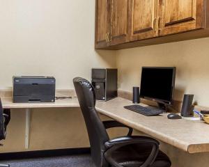 an office with a desk with a computer and a chair at Quality Inn Burlington near Hwy 34 in Burlington
