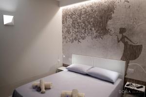 Ένα ή περισσότερα κρεβάτια σε δωμάτιο στο Doña Marìa - Holiday Home