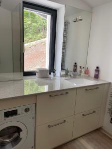 Kuchyň nebo kuchyňský kout v ubytování Modern Living Sankt Gilgen