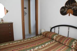 Krevet ili kreveti u jedinici u okviru objekta Casa Miclara appartamento - Agave