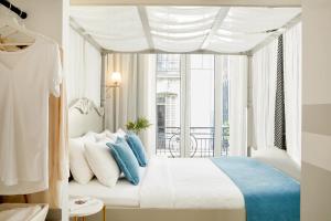 Posteľ alebo postele v izbe v ubytovaní Hotel Luxembourg