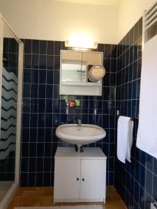Ванна кімната в Petite maison d'hôtes