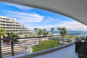 a view of the ocean from the balcony of a resort at INFINITY VIEW Arenales in Arenales del Sol