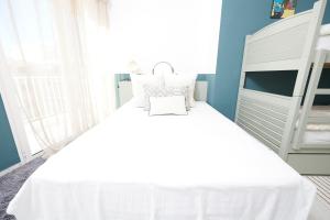 Ein Bett oder Betten in einem Zimmer der Unterkunft Palm Beach Amazing view