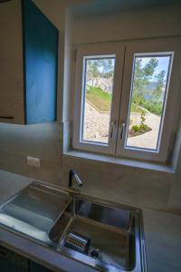 Fotografie z fotogalerie ubytování Astrali Stone Villas v destinaci Paramythia
