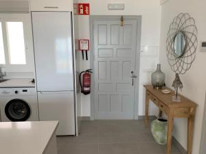 Kuchyň nebo kuchyňský kout v ubytování Apartamento en Playa Santo Tomas