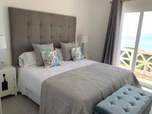 Postel nebo postele na pokoji v ubytování Apartamento en Playa Santo Tomas