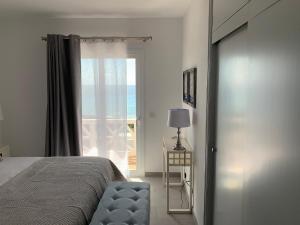 Postel nebo postele na pokoji v ubytování Apartamento en Playa Santo Tomas
