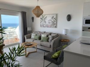 Khu vực ghế ngồi tại Apartamento en Playa Santo Tomas