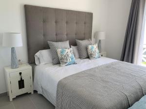 Postel nebo postele na pokoji v ubytování Apartamento en Playa Santo Tomas